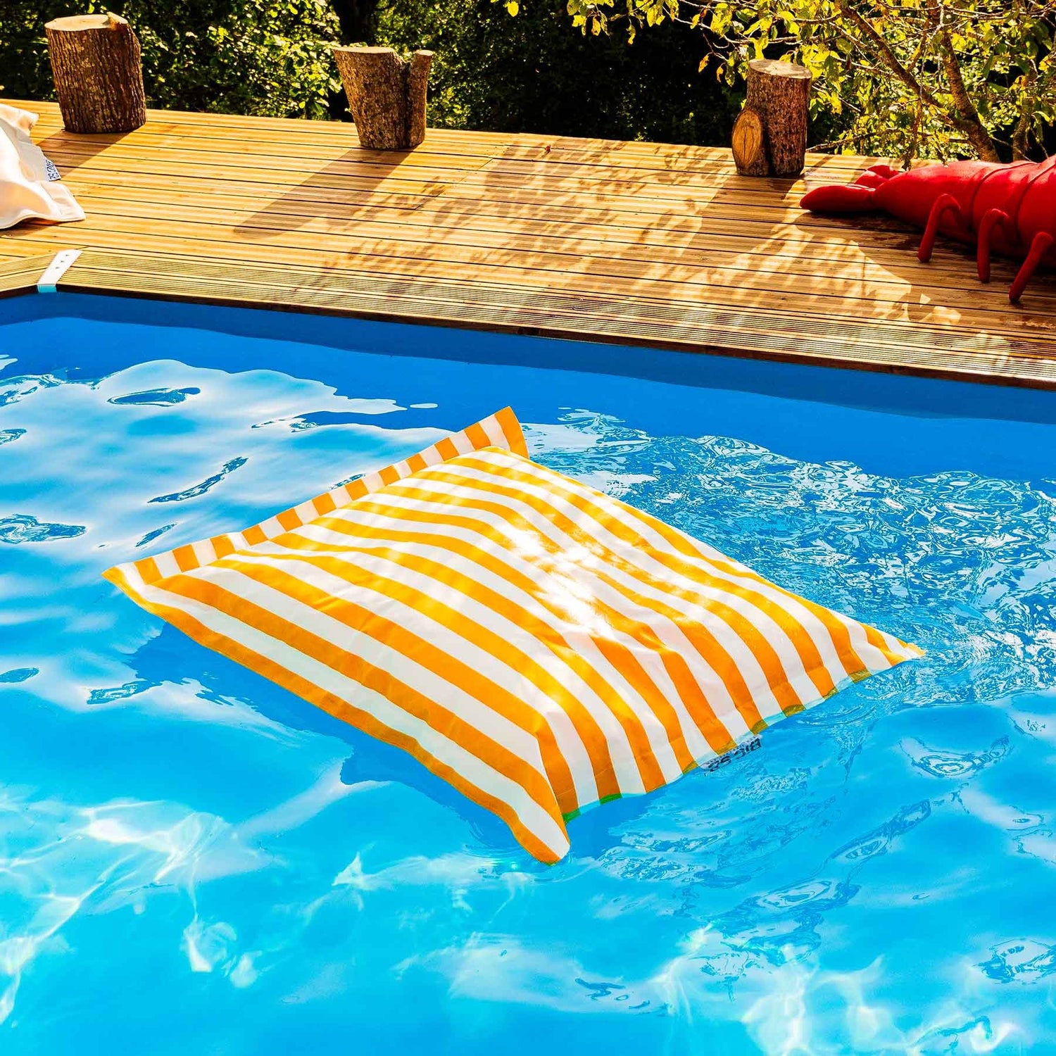 Gestreifter gelber Pool-Pouf Deauville